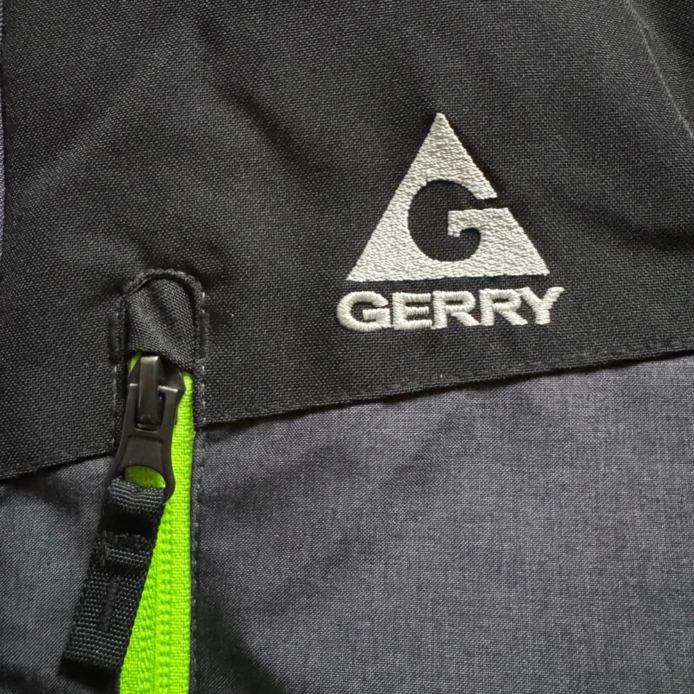 Gerry Black and Gray Jacket with Neon Green Accents.  Boys size Large 14-16